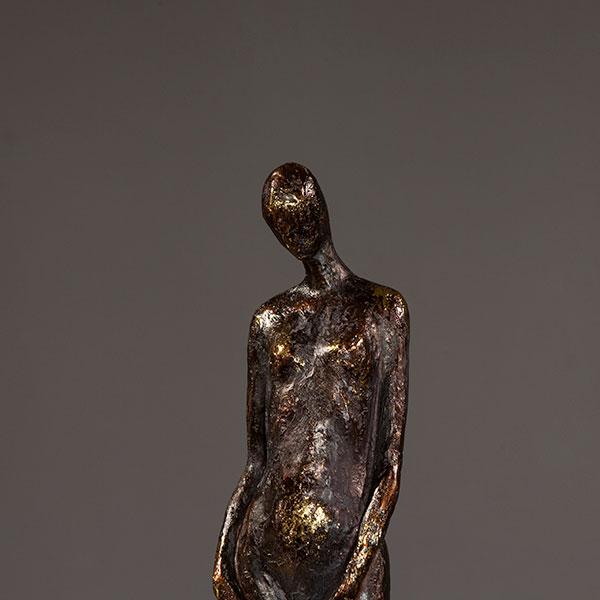 BROWN/GOLD FIGURINE